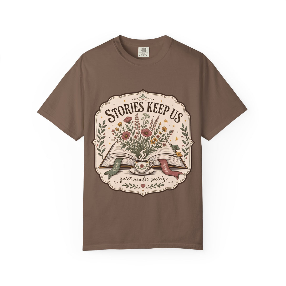 Stories Keep Us Quiet Reader Society shirt in Espresso featuring an open book, wildflowers and a floral teacup.