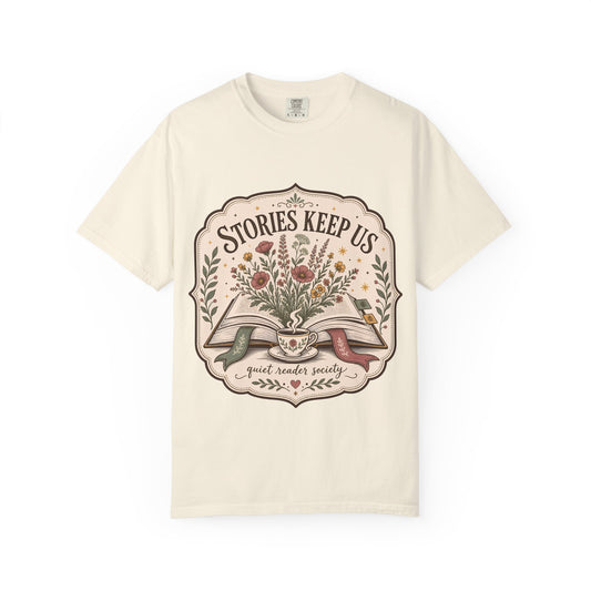 Stories Keep Us Quiet Reader Society shirt in Ivory featuring an open book, wildflowers and a floral teacup.