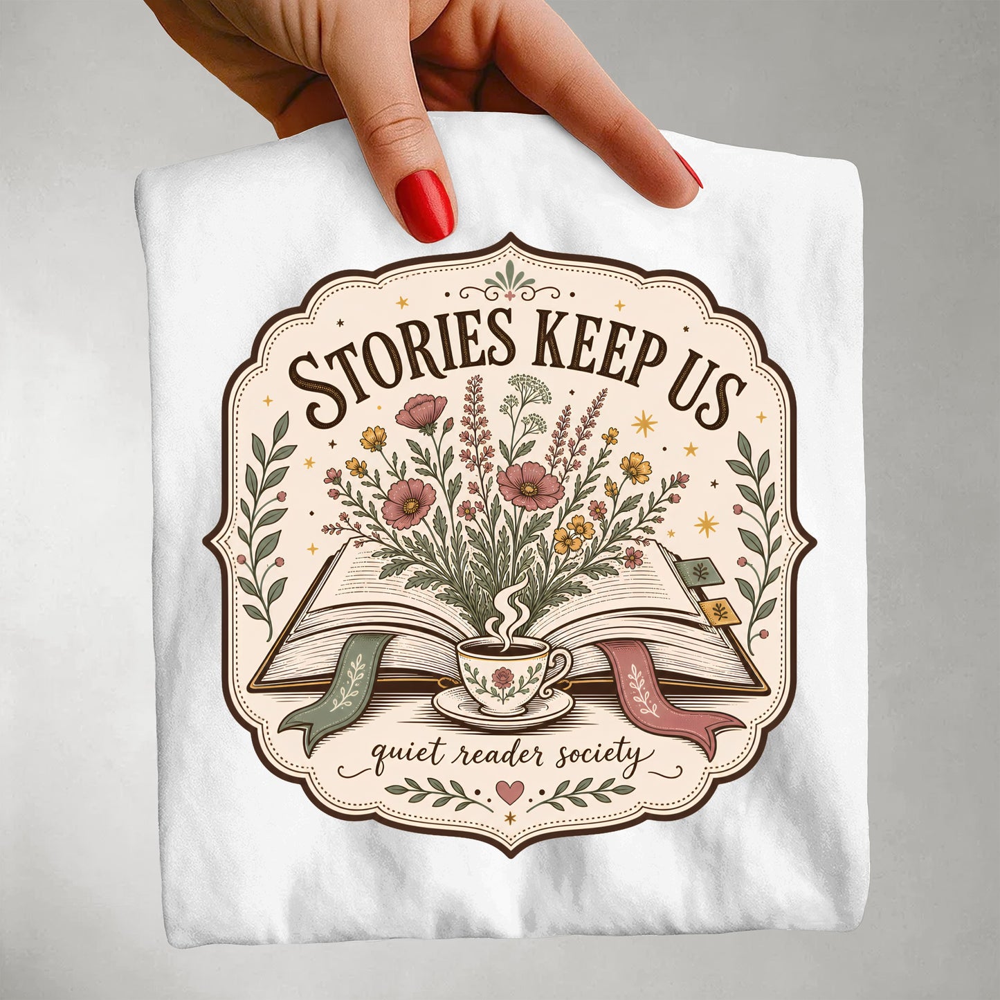 Woman wearing the Stories Keep Us white book lover T-shirt inspired by reading, stories and literary life.