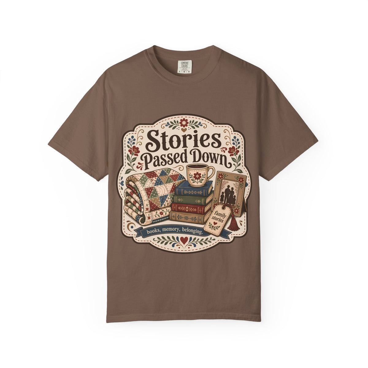 Stories Passed Down family stories T-shirt with books, patchwork quilt, floral mug, family photograph and vintage folk details on Espresso.