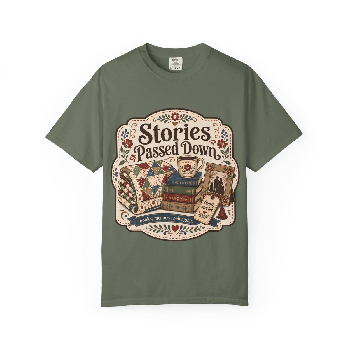 Stories Passed Down family stories T-shirt with books, patchwork quilt, floral mug, family photograph and vintage folk details on Moss.