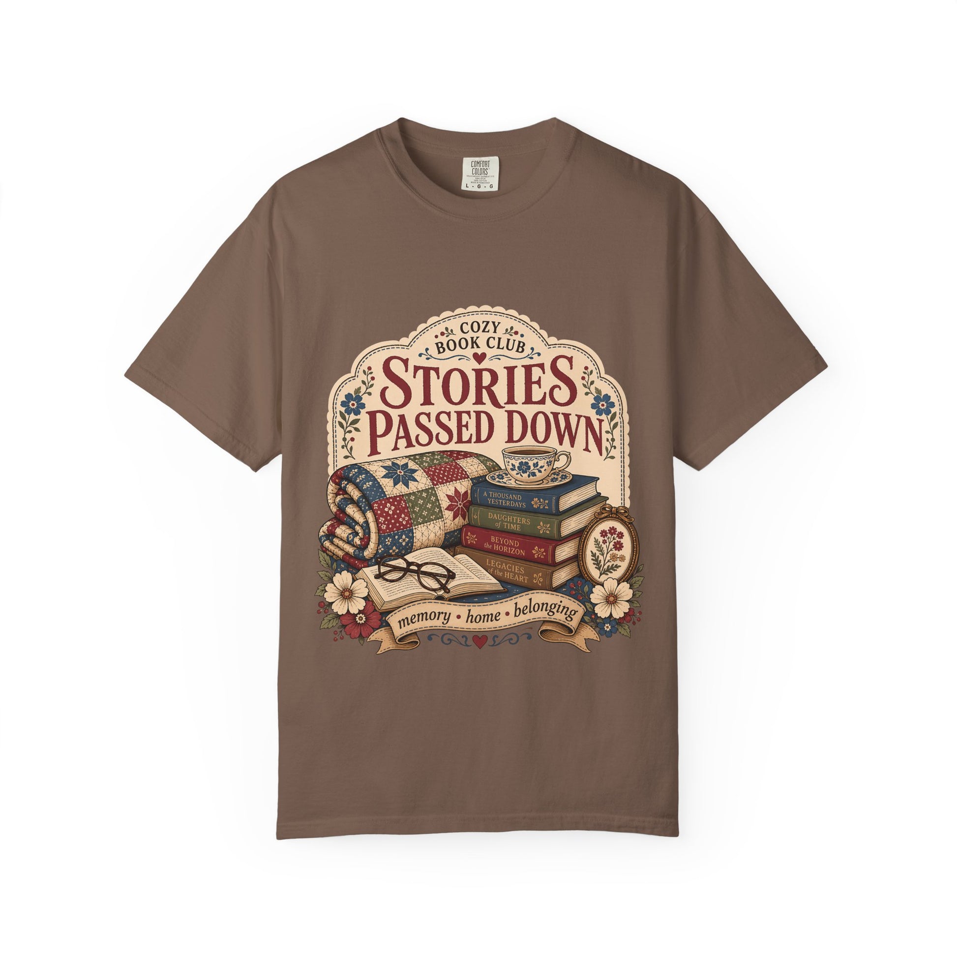 Stories Passed Down literary T-shirt with books, a patchwork quilt and floral keepsakes on Espresso.