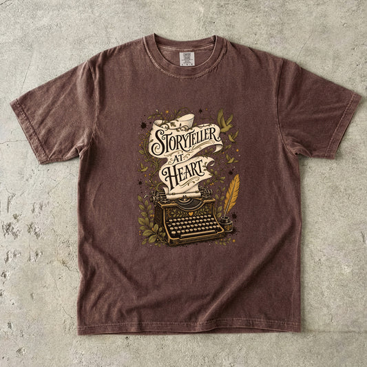 Storyteller at Heart writer shirt in Espresso featuring a vintage typewriter, manuscript scroll, quill, birds and botanical details.