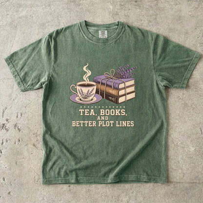 Moss reading T-shirt featuring Tea, Books, and Better Plot Lines with stacked books, a steaming lavender teacup and lavender sprigs.