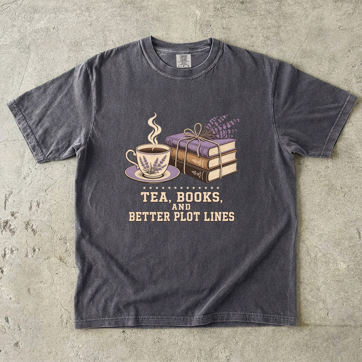 Pepper reading T-shirt featuring Tea, Books, and Better Plot Lines with stacked books, a steaming lavender teacup and lavender sprigs.