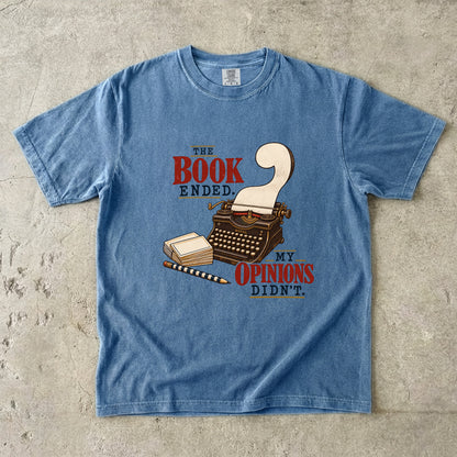 Blue Jean reader T-shirt with “The Book Ended. My Opinions Didn’t.” and a vintage typewriter illustration