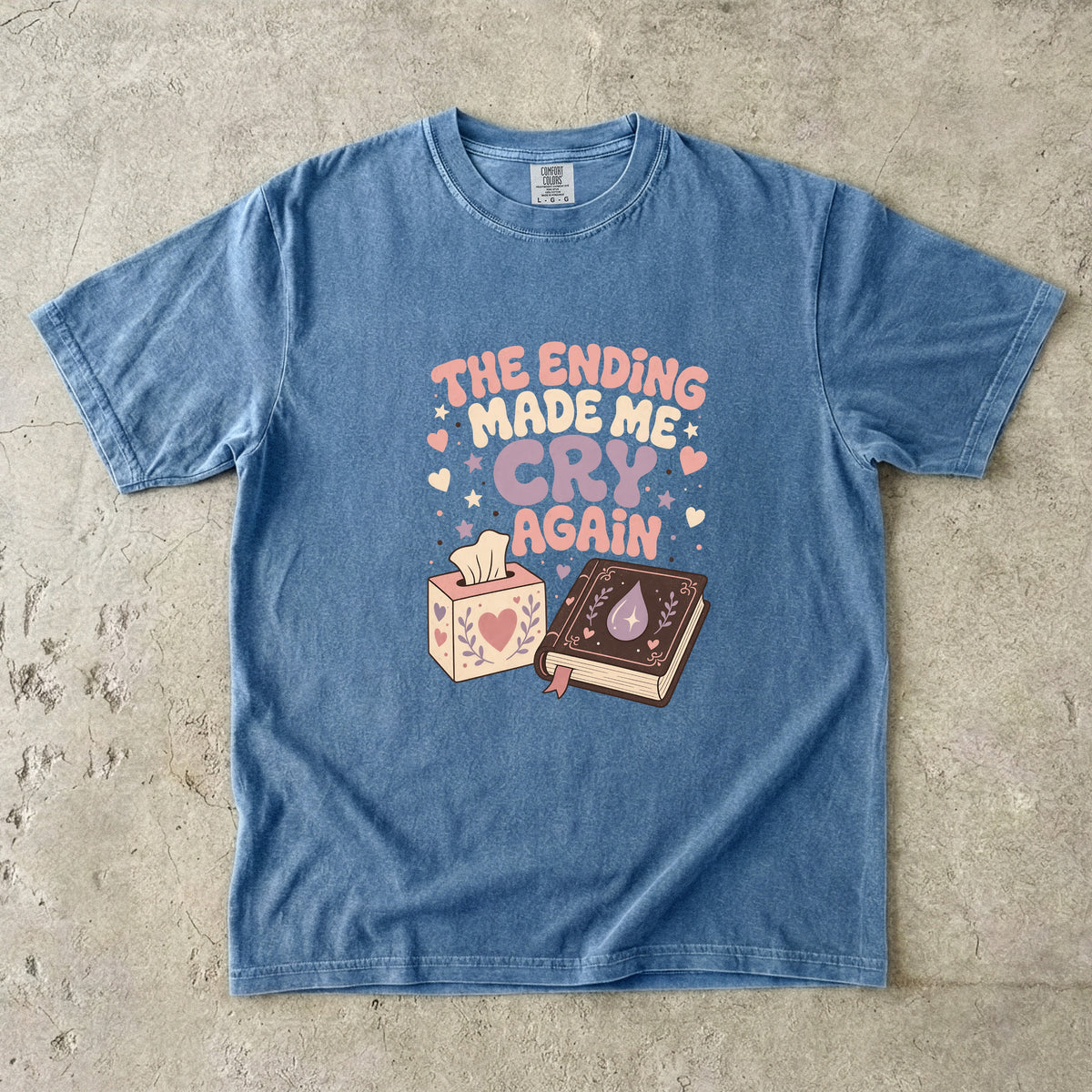 The Ending Made Me Cry Again funny reading shirt in Blue Jean featuring playful retro typography, book and tissue box artwork.