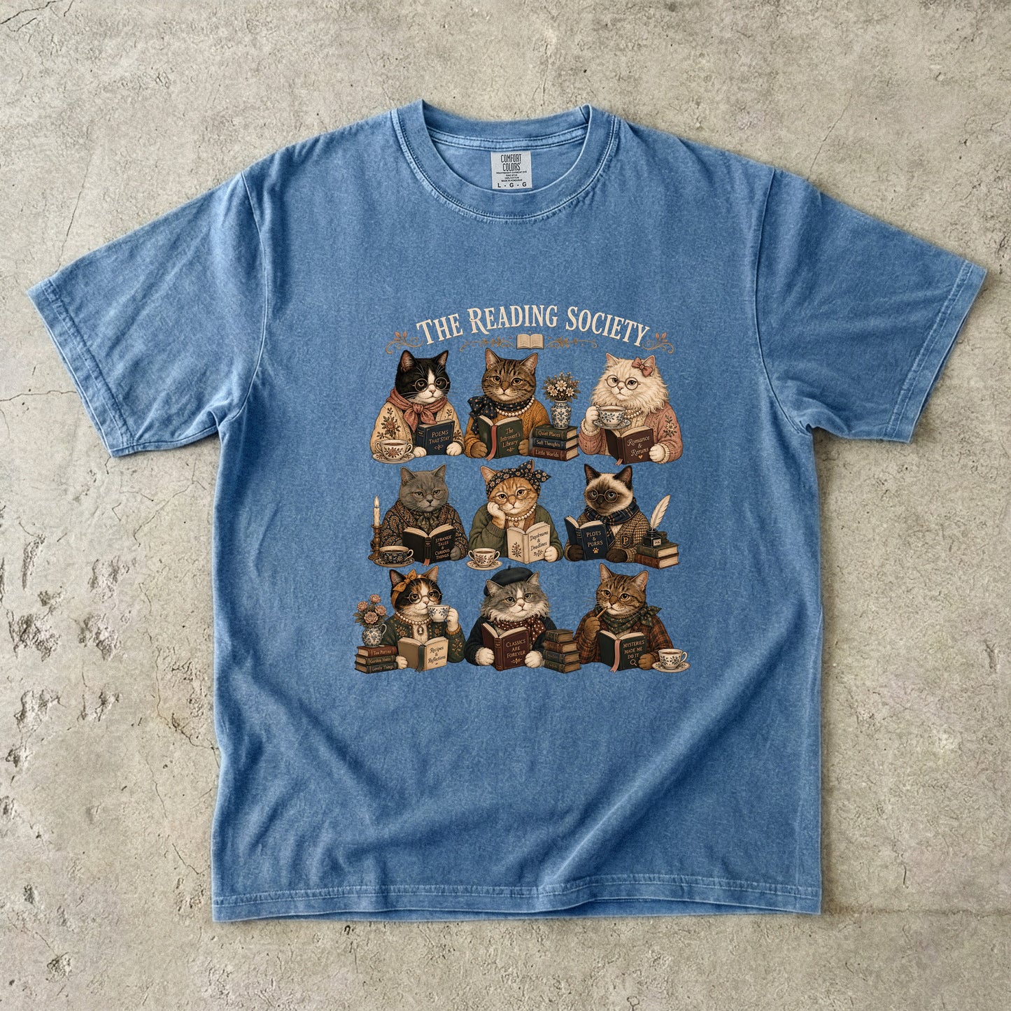 Blue Jean Comfort Colors book lover T-shirt featuring The Reading Society vintage cats reading books with tea.