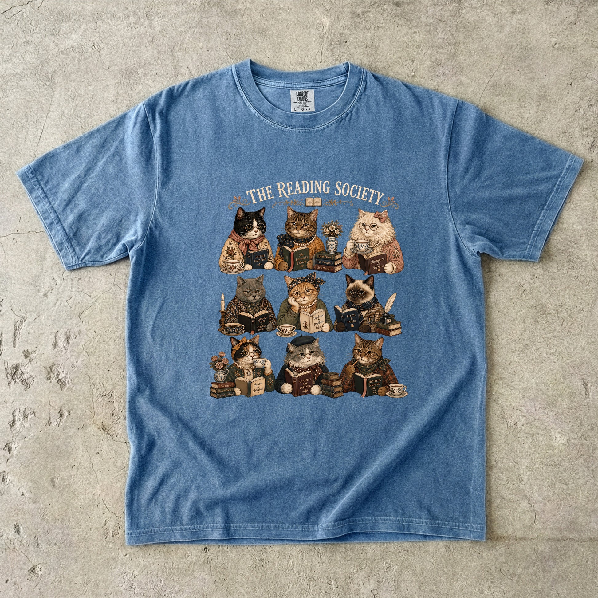 Blue Jean Comfort Colors book lover T-shirt featuring The Reading Society vintage cats reading books with tea.