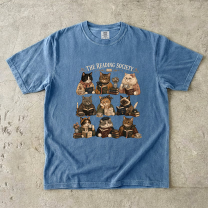 Blue Jean Comfort Colors book lover T-shirt featuring The Reading Society vintage cats reading books with tea.