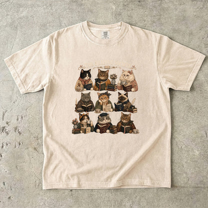 Ivory Comfort Colors book lover shirt with The Reading Society illustration of cats, books and teacups.