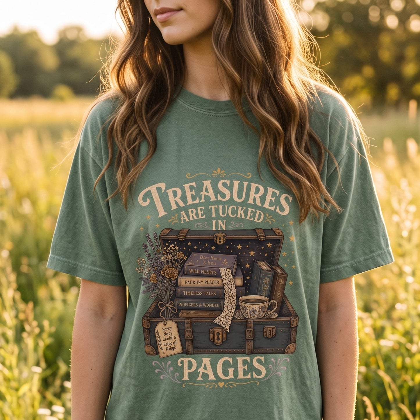 Treasures Are Tucked in Pages book lover T-shirt featuring a vintage trunk filled with books, flowers and storybook details