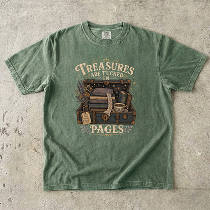 Treasures Are Tucked in Pages book lover T-shirt in Moss with a vintage trunk, books, flowers and teacup artwork