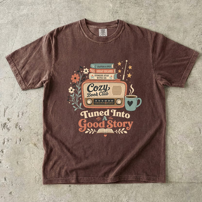Front view of an Espresso Comfort Colors Book Lover T-shirt with a vintage radio, books and coffee illustration.