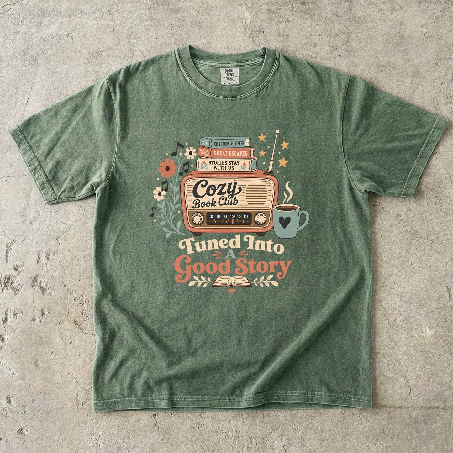 Front view of a Moss Comfort Colors Book Lover T-shirt featuring the vintage book club radio illustration.