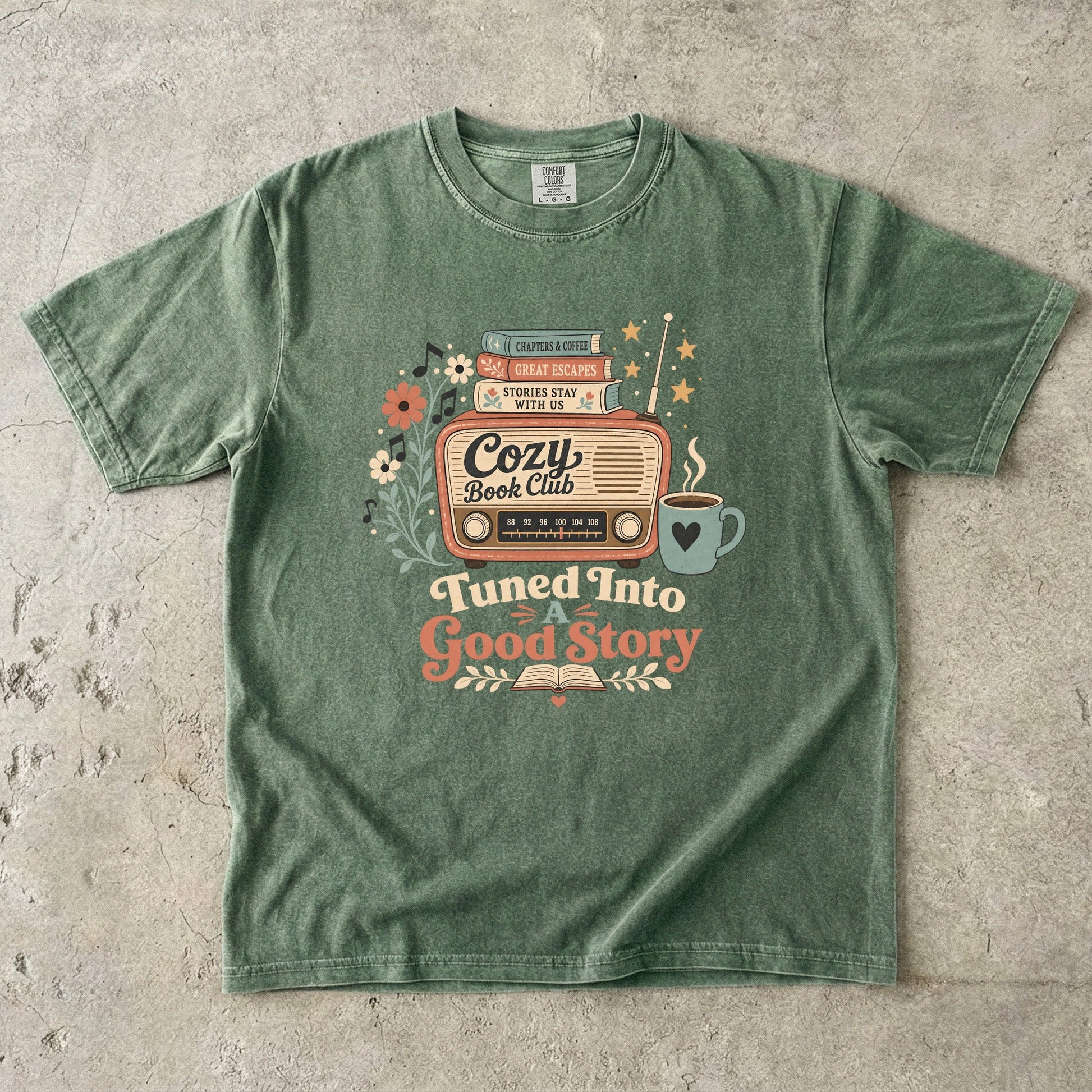 Front view of a Moss Comfort Colors Book Lover T-shirt featuring the vintage book club radio illustration.