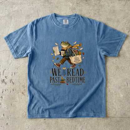 Blue Jean Comfort Colors book lover T-shirt with the playful We Read Past Bedtime frog and library adventure design.