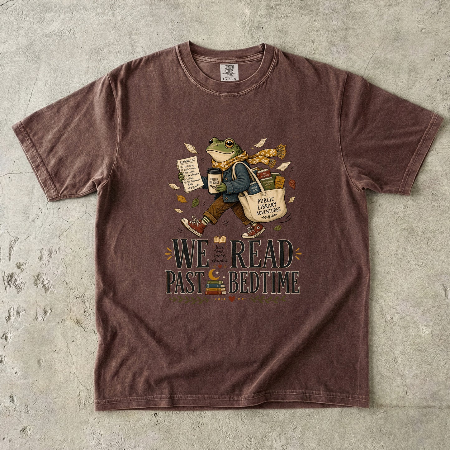 Espresso Comfort Colors book lover T-shirt featuring the We Read Past Bedtime literary frog design with books and library bag.