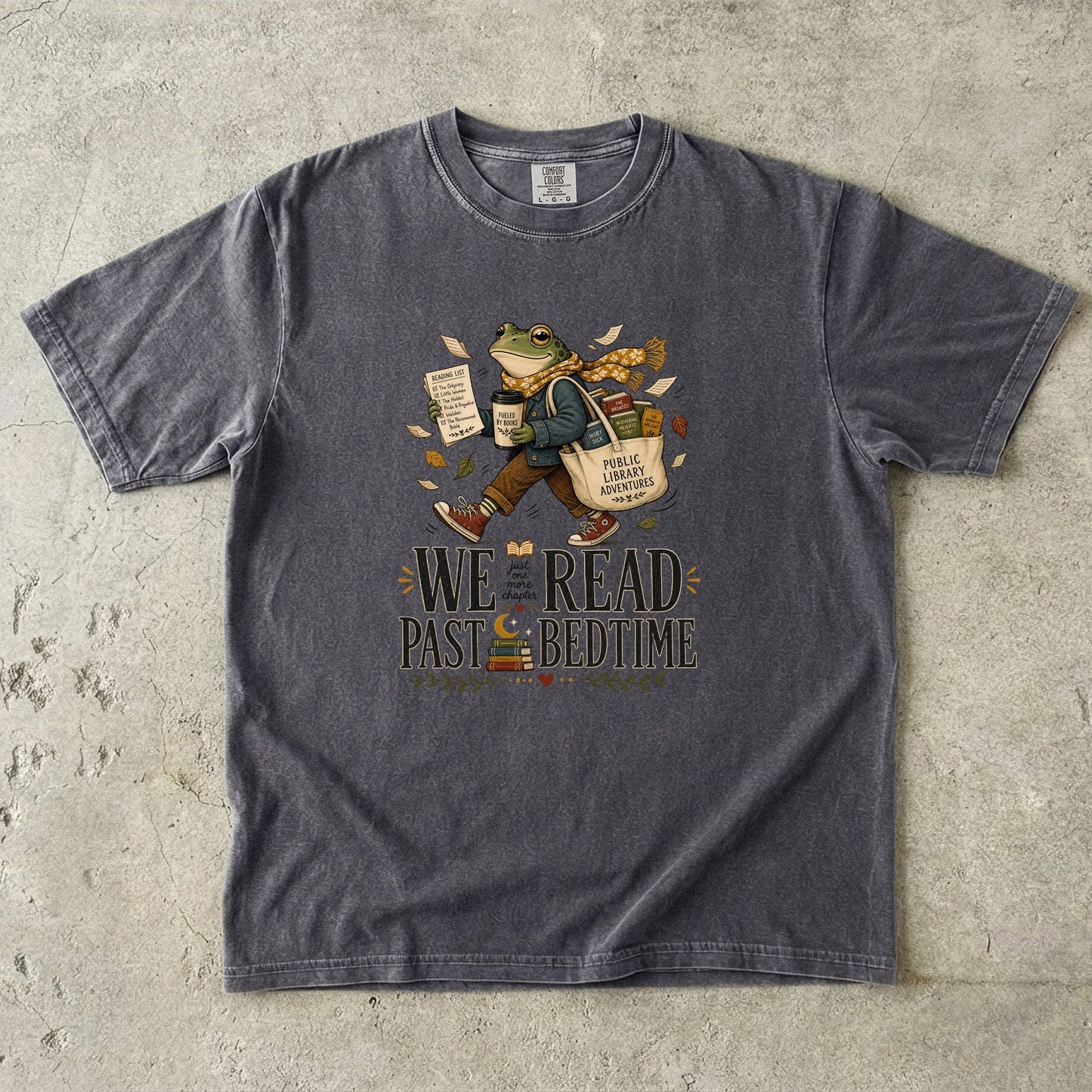Pepper Comfort Colors We Read Past Bedtime bookish T-shirt featuring a vintage-style literary frog and books.