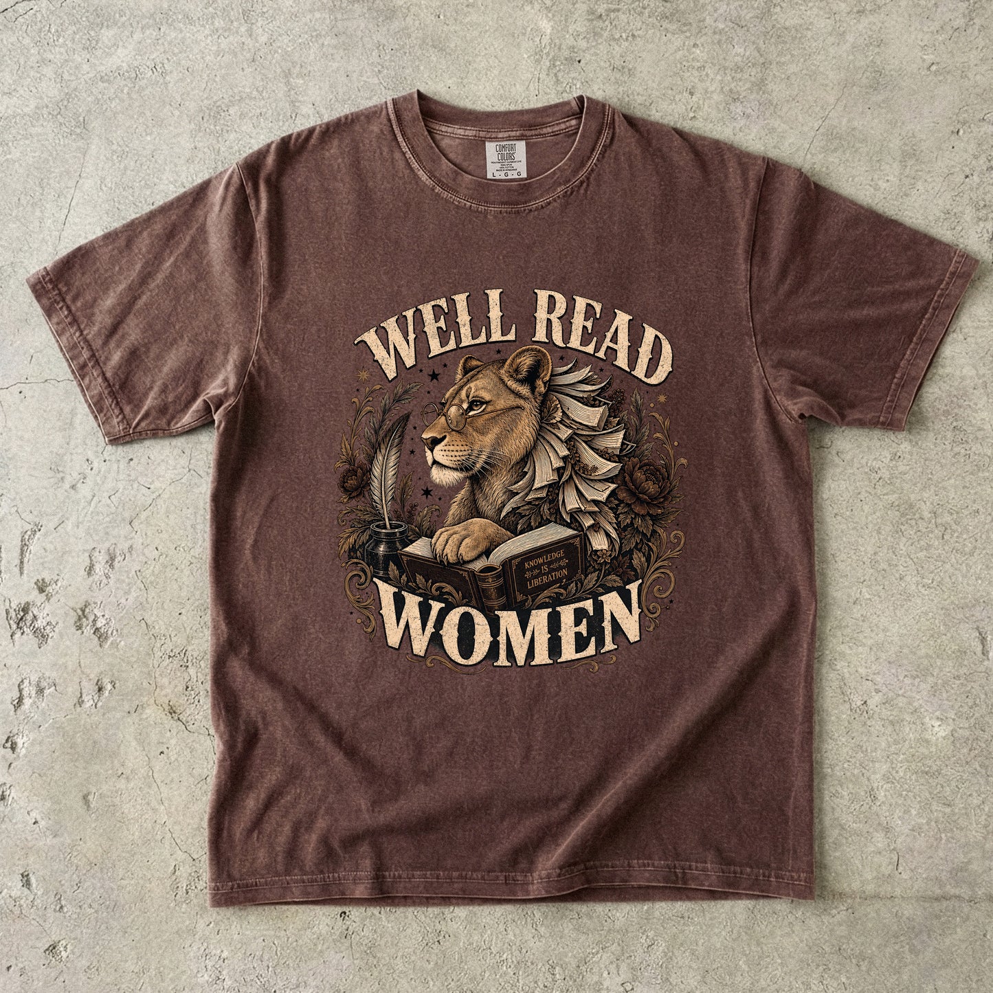 Espresso Comfort Colors T-shirt featuring the vintage Well Read Women lioness and book illustration.