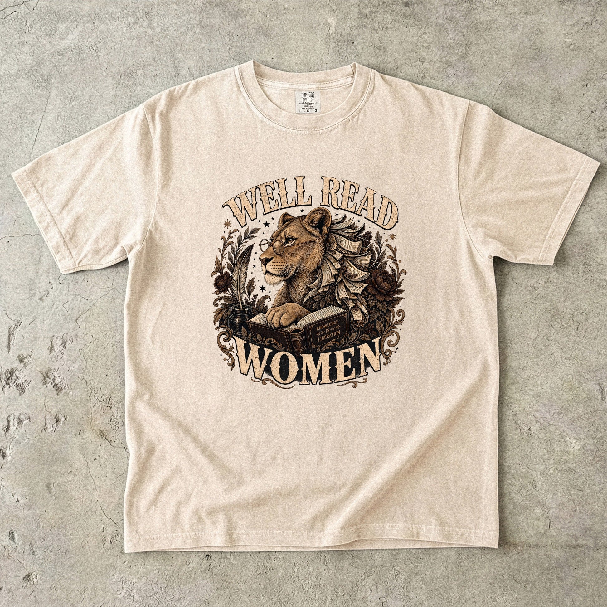 Ivory Comfort Colors book lover T-shirt featuring the Well Read Women vintage literary lioness design.