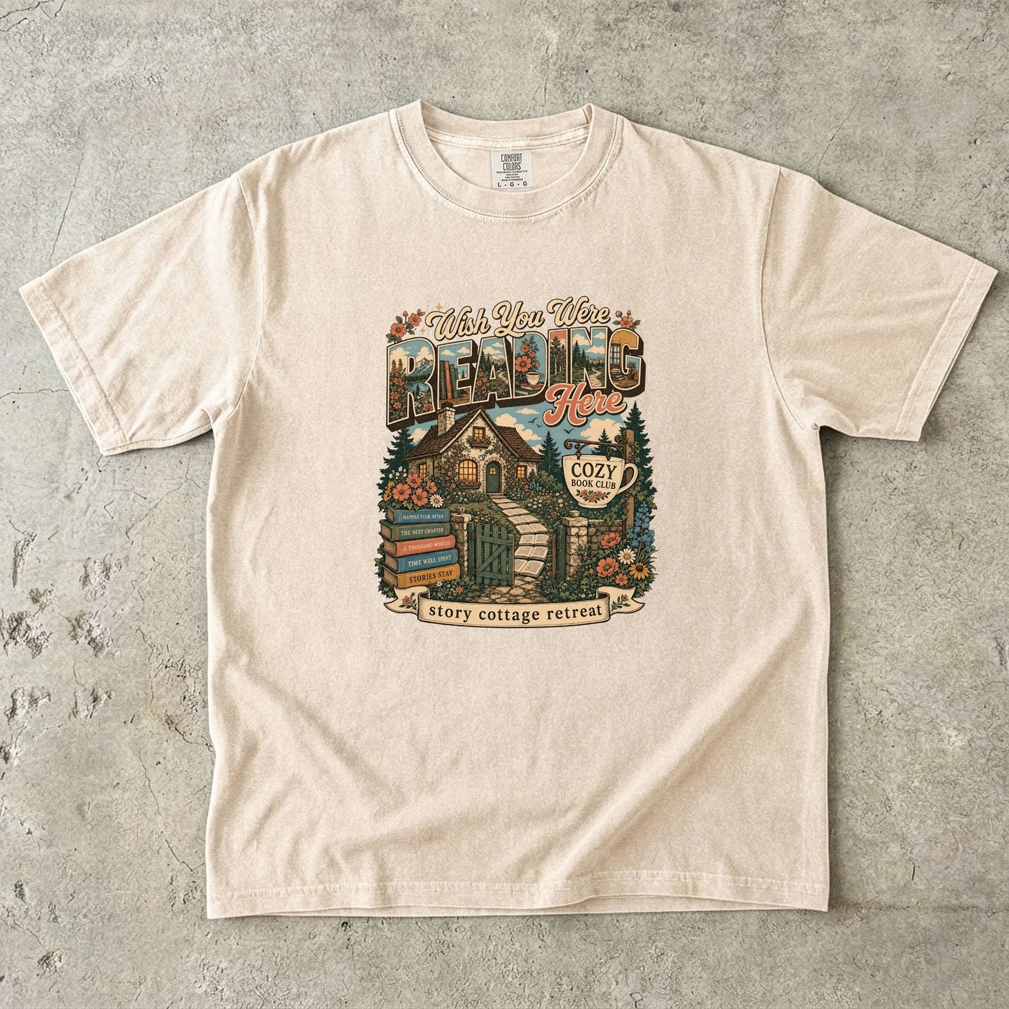 Wish You Were Reading Here book lover T-shirt with story cottage and garden reading retreat design on Ivory.